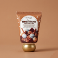 Bioaqua Moist Hand Chocolate Cake hand cream on a brown background
