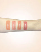 Arm swatches comparing Swiss Miss lipstick shades B101, B102, B103, and B104.