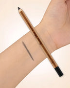 Swiss Miss Eye Pencil in shade 01 Black resting on a forearm with a single line pigment swatch.