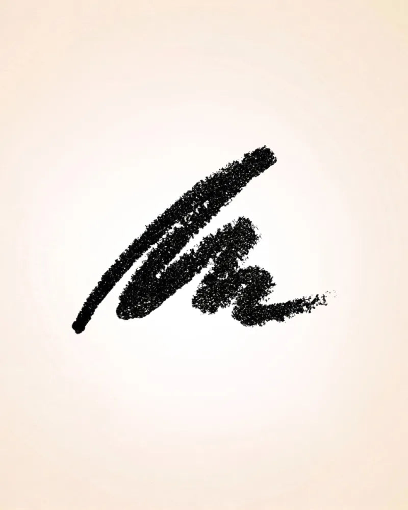 Rich matte black swatch showing the creamy texture and pigment payoff of Swiss Miss Eye Pencil.
