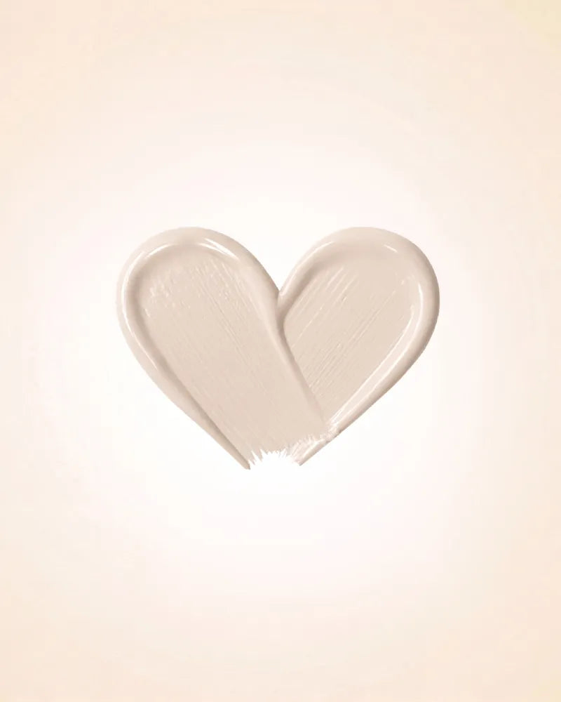 Heart-shaped liquid texture swatch of Swiss Miss Matte and Poreless CC Concealer in shade Pearl Ivory SM 01
