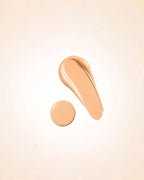 Liquid foundation smear swatch and drop of Swiss Miss Matte and Poreless CC Foundation in shade Beige SM 04