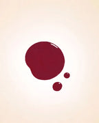 Color swatch drop of Swiss Miss Cherry Charisma shade F-409 quick dry nail polish.