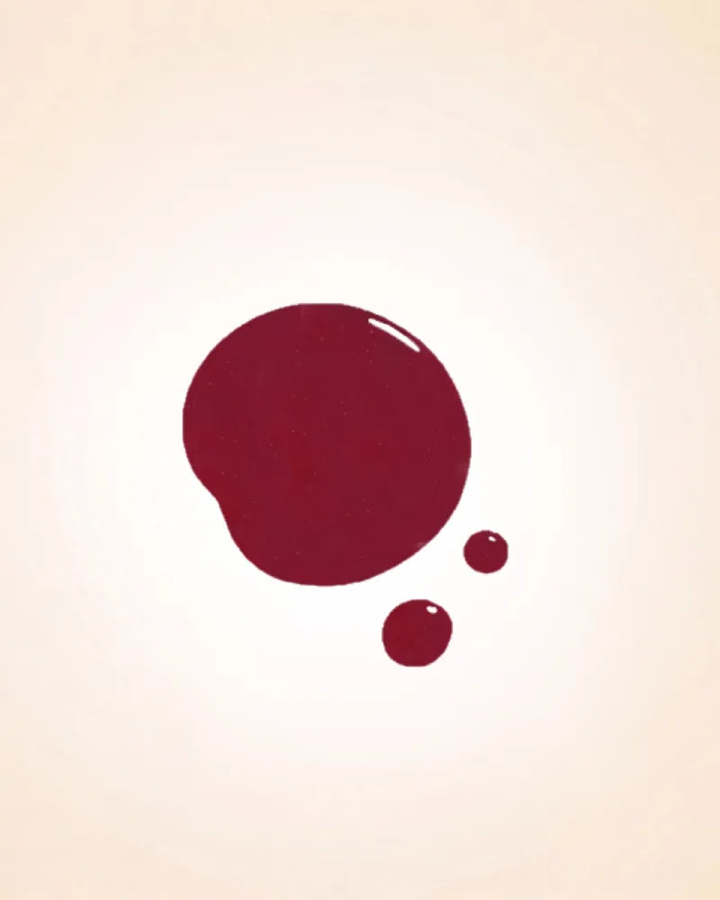 Color swatch drop of Swiss Miss Cherry Charisma shade F-409 quick dry nail polish.