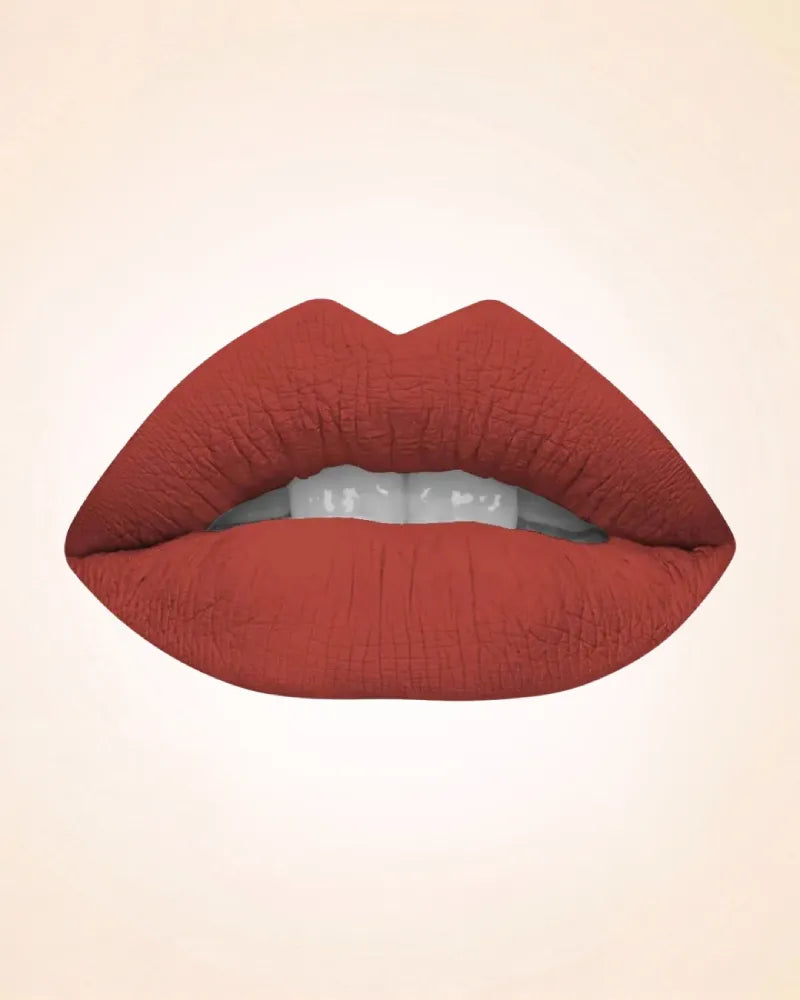 Lip swatch application of Swiss Miss Classic Lipstick in shade Burnt Peach M-50 showing a smooth terracotta nude lip finish.
