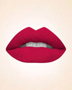 Lip application swatch of Swiss Miss Classic Lipstick shade Cherry Berry M-18 displaying a rich berry lip finish.