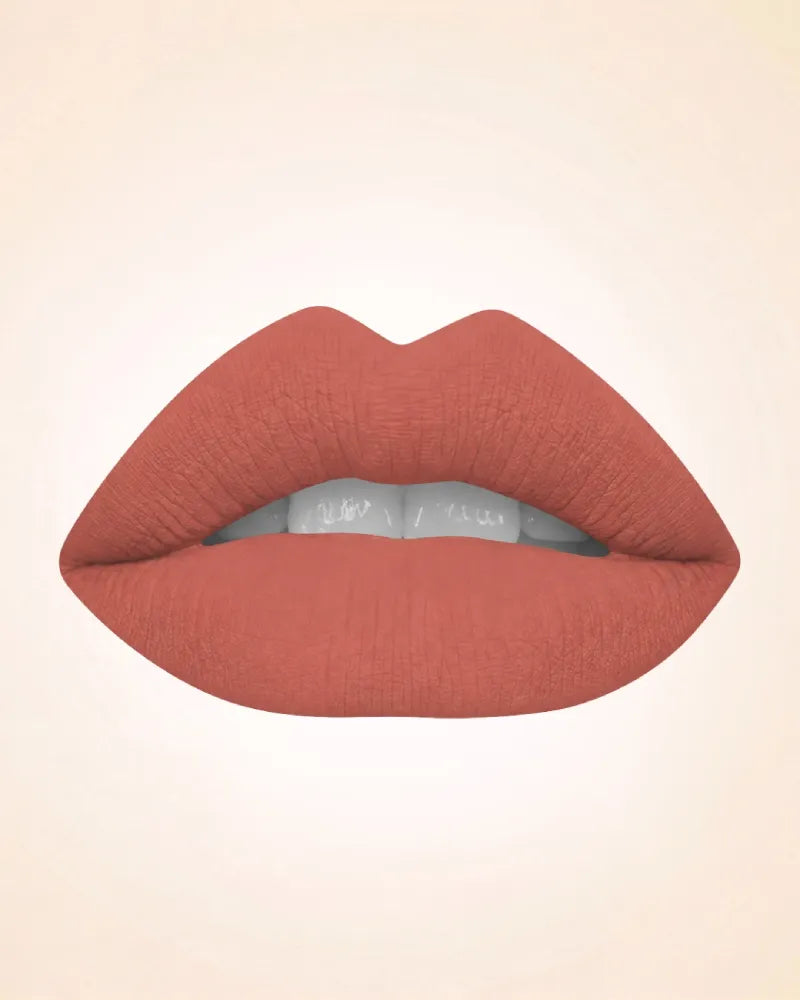 Close-up lip swatch of Swiss Miss Classic Lipstick in Cocoa Crush M-518 shade.
