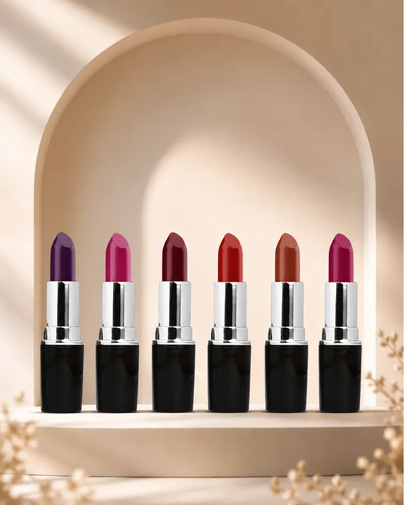 Assorted shades from the Swiss Miss Classic Lipstick collection lined up on a neutral display stand.