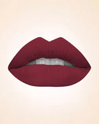 Close-up lip swatch of Swiss Miss Classic Lipstick in Deep Maroon M-226 shade.