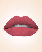 Close-up lip swatch of Swiss Miss Classic Lipstick in Flamingo Pink M-228 shade.