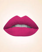 Close-up lip swatch of Swiss Miss Classic Lipstick in Raspberry Rose M-257 shade.