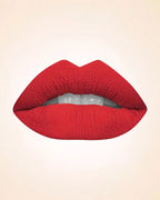 Close-up lip swatch of Swiss Miss Classic Lipstick in Ribbon Red M-224 shade.