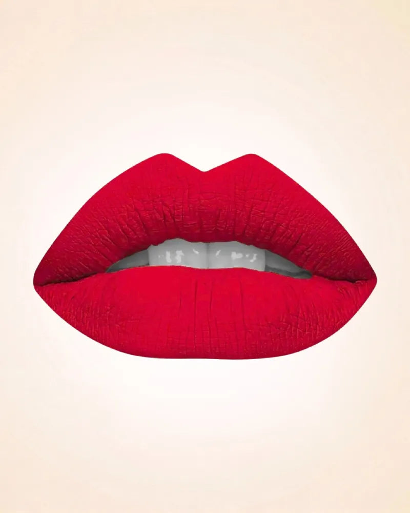 Close-up lip swatch of Swiss Miss Classic Lipstick in Ruby Romance M-515 shade.