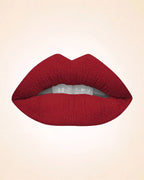 Close-up lip swatch of Swiss Miss Classic Lipstick in True Maroon M-284 shade.