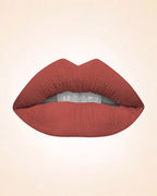 Close-up lip swatch of Swiss Miss Classic Lipstick in Viva Glam M-235 shade.