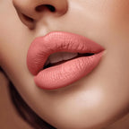 Close-up of lips wearing Swiss Miss Romantic Pink B-106 matte lipstick shade.