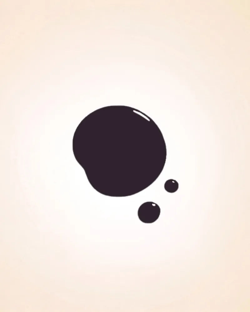 Glossy dark purple black liquid nail polish drop swatch in shade Satin 214 showing coverage and texture.