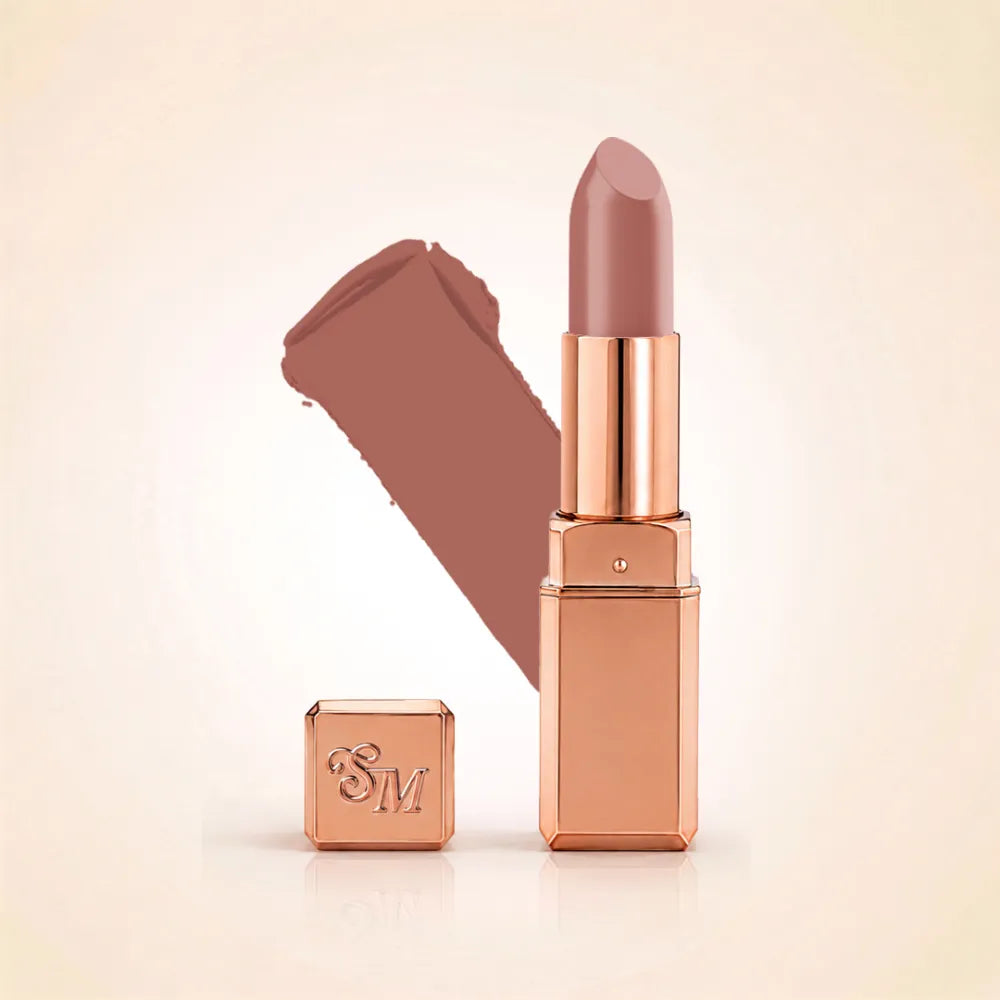 Swiss Miss Silk Lipstick in shade So Plum (720) in gold bullet packaging shown alongside a textured cream color swatch.